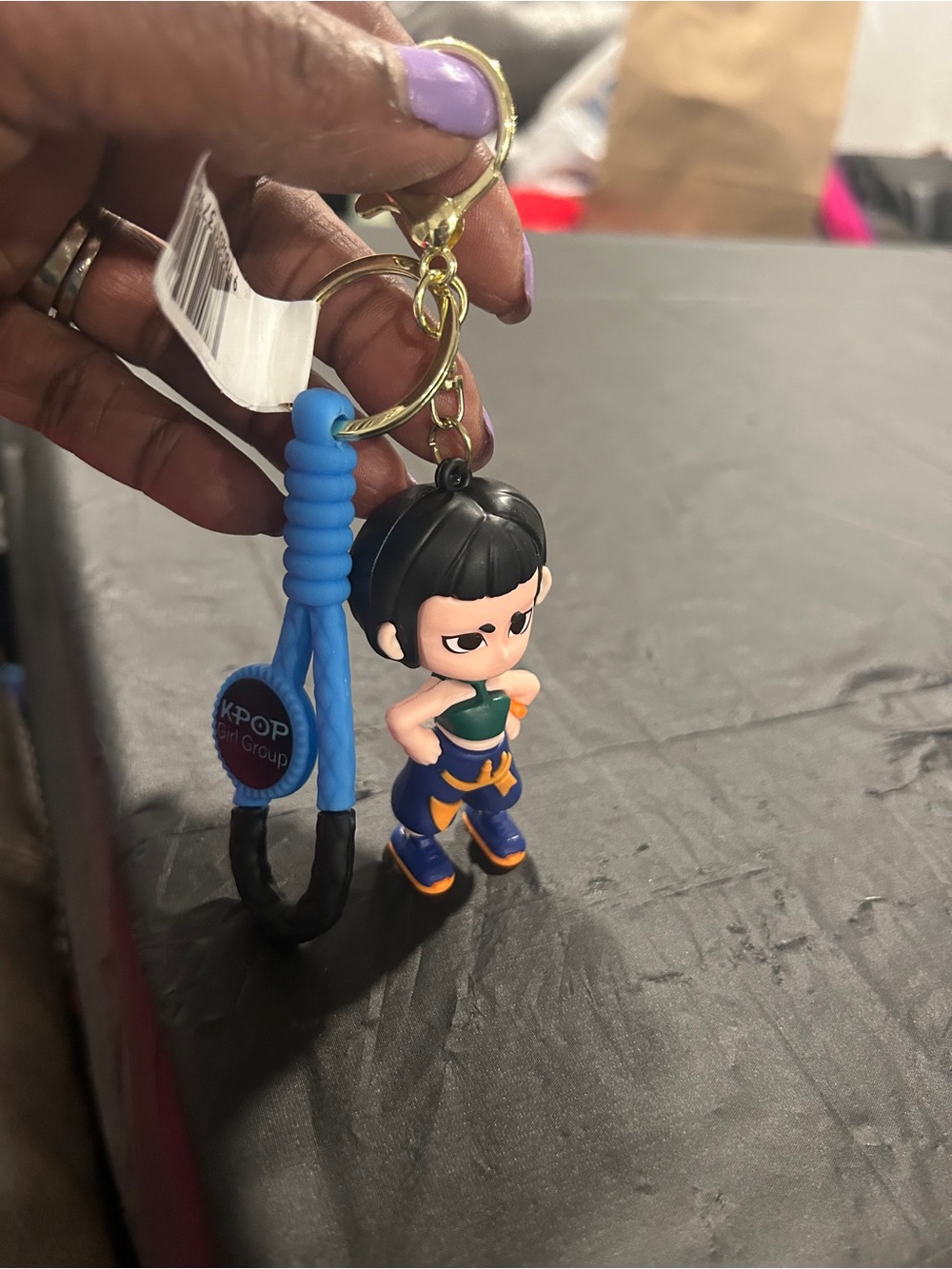 pop Blue & Black K-Pop Girl Character Keychain bag accessory with Gold Hardware